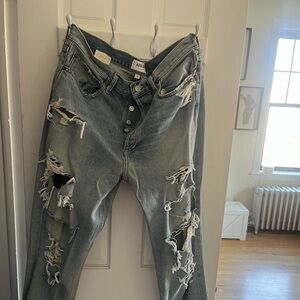 AGOLDE 90’s mid rise destroyed blue jeans. Brand new with tag half cut off.